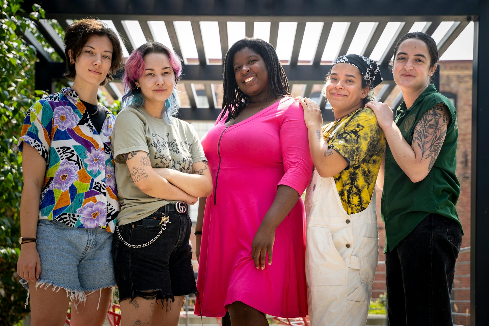 Maddy Flisk, Natalie Ollila, Victoria Leonard, Zant Peralta and CJ Jennings, the co-founders of new queer bar the Brass Strap pose together in Minneapolis on Monday, July 24, 2023. Opening in 2025, the Brass Strap will be the city's first lesbian and queer bar.
