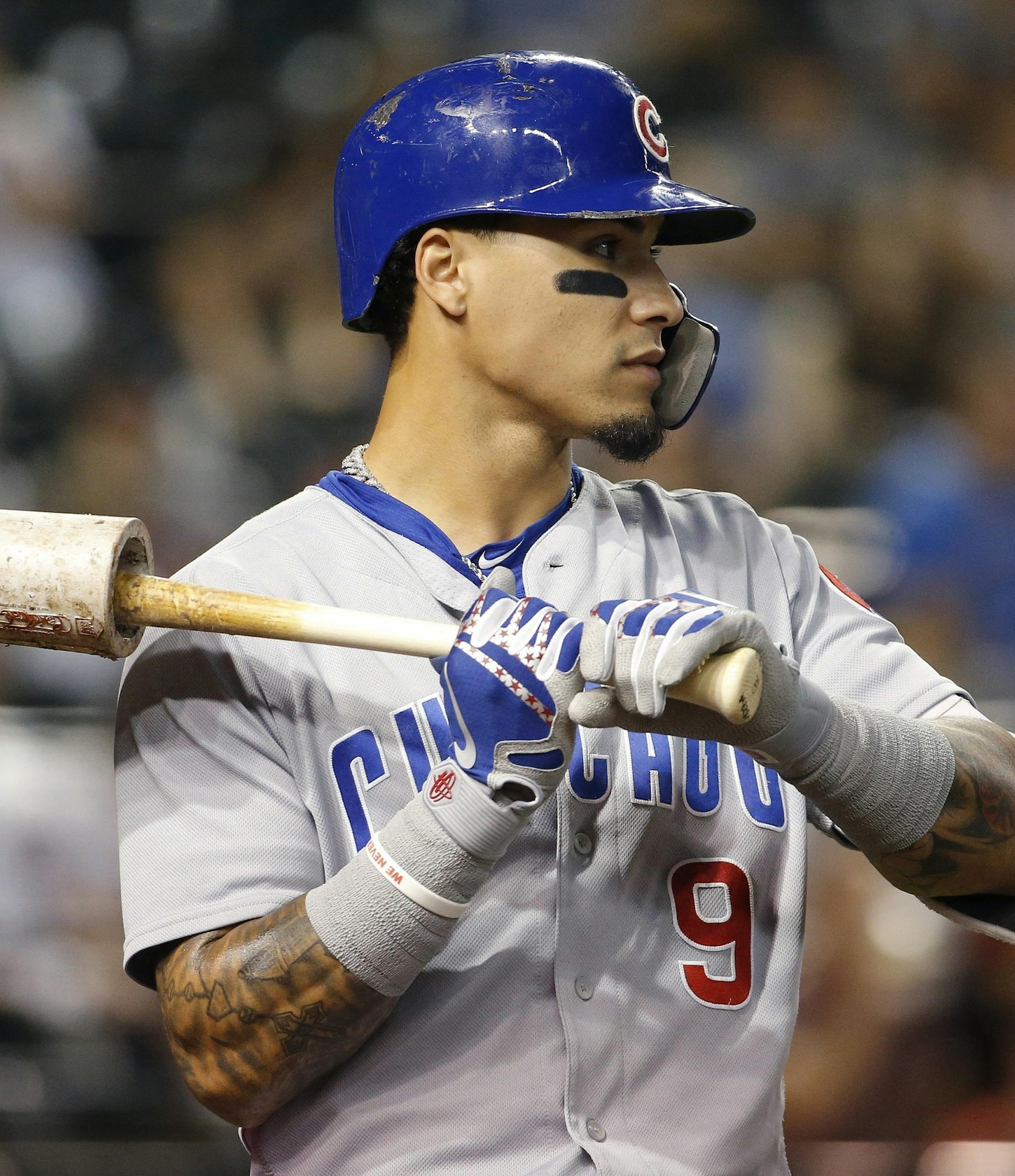 Chicago Cubs' Javier Baez waits to bat against the Arizona Diamondbacks during the first inning of a baseball game Wednesday, Sept. 19, 2018, in Phoenix. (AP Photo/Ross D. Franklin) ORG XMIT: MIN2018092420304435