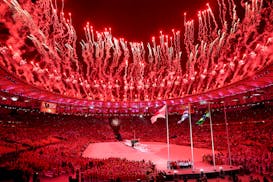 Summer Olympic Games Closing Ceremony - Red fireworks after the transfer to Japan and the Japan flag was raised. Maracana Stadium, Rio Brazil. Gymnast