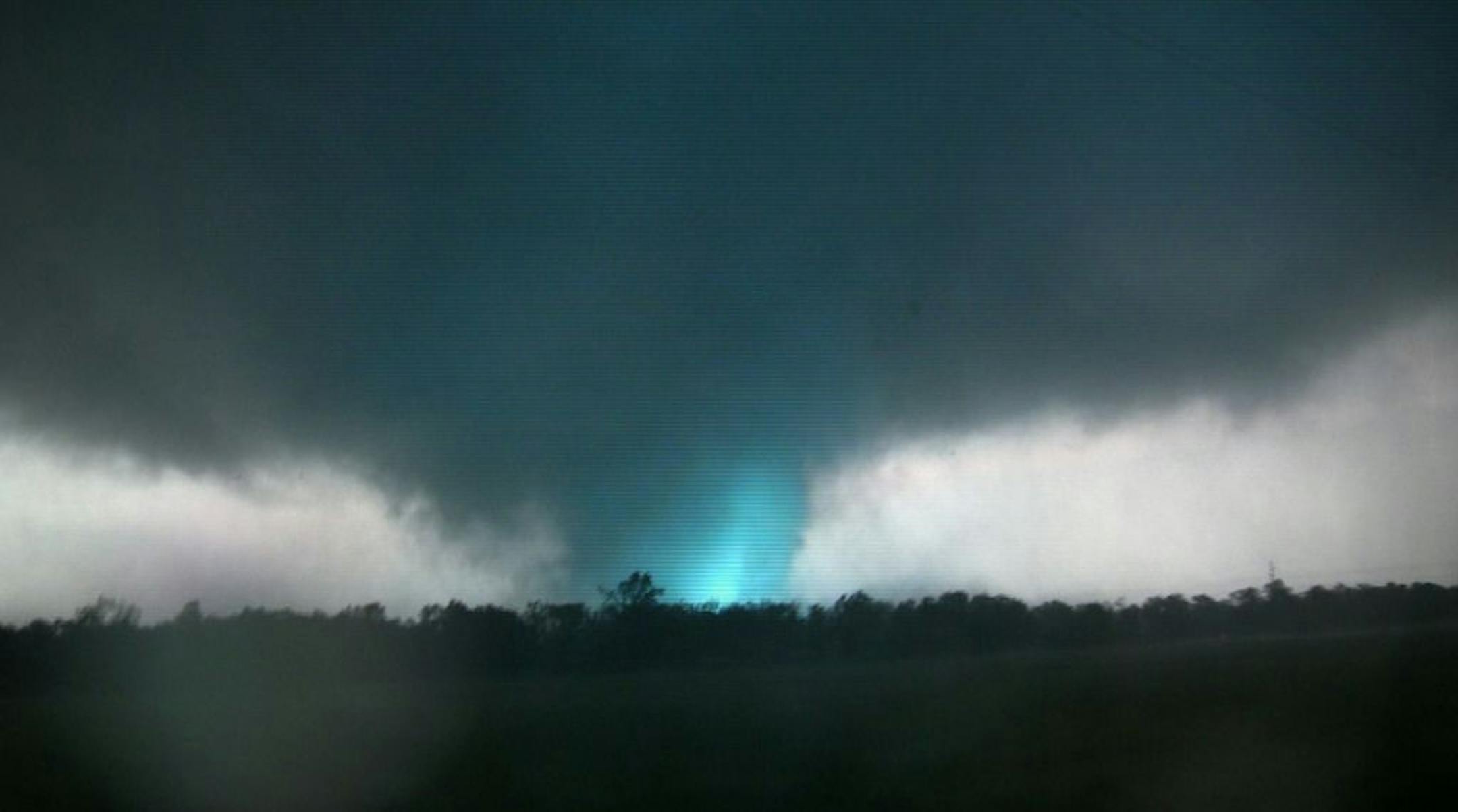 This frame grab from video shows lightning inside a massive tornado on Sunday, May 22, 2011, outside Joplin, Mo.