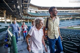 Joy Ryan, 89, and her grandson Brad Ryan, 38, tour Wrigley Field Wednesday Sept. 25, 2019 in Chicago. (Armando L. Sanchez/Chicago Tribune/TNS) ORG XMI