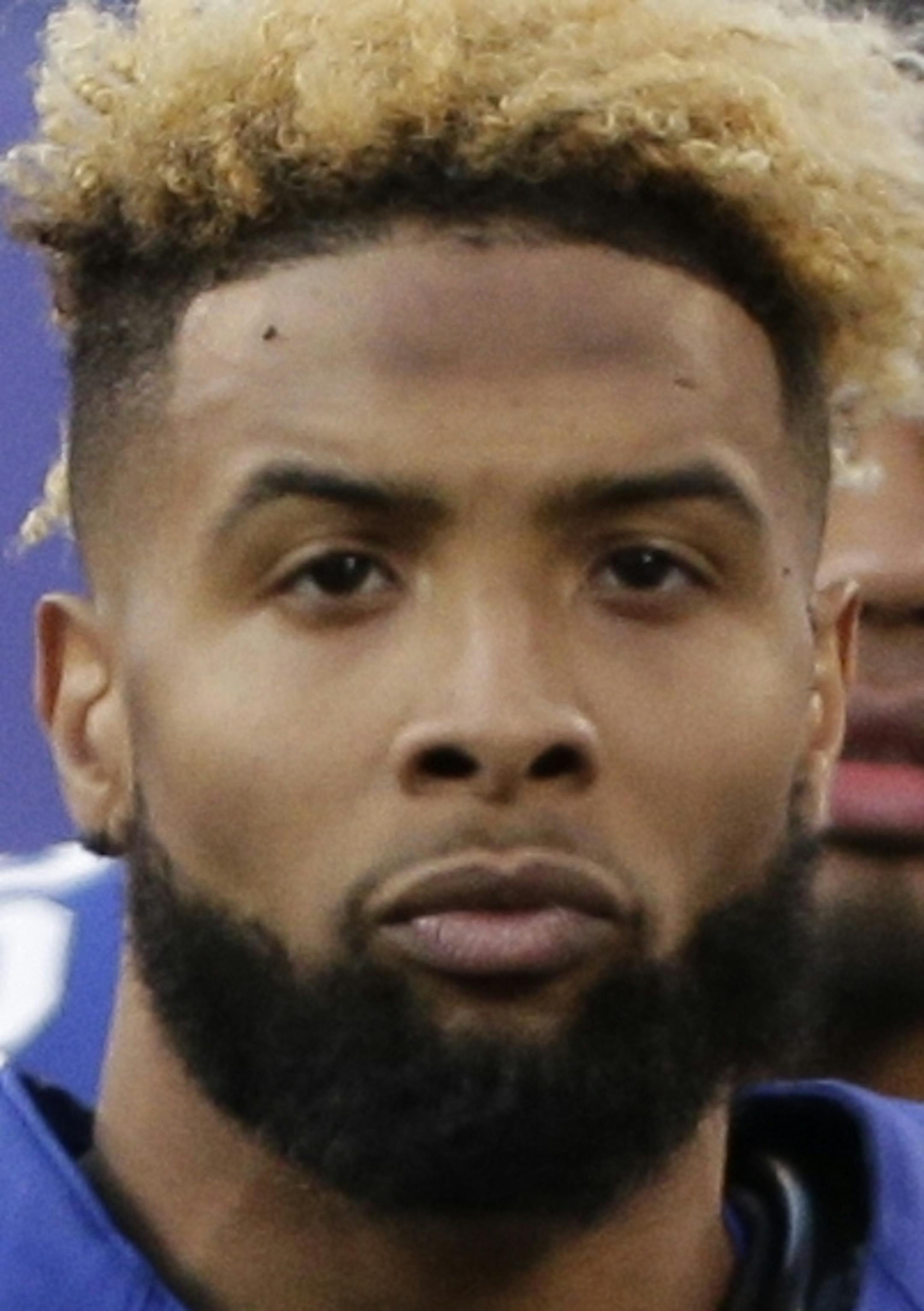 New York Giants' Odell Beckham (13) stands on the sidelines during the second half of an NFL football game against the Carolina Panthers Sunday, Dec. 20, 2015, in East Rutherford, N.J. (AP Photo/Peter Morgan) ORG XMIT: ERU1