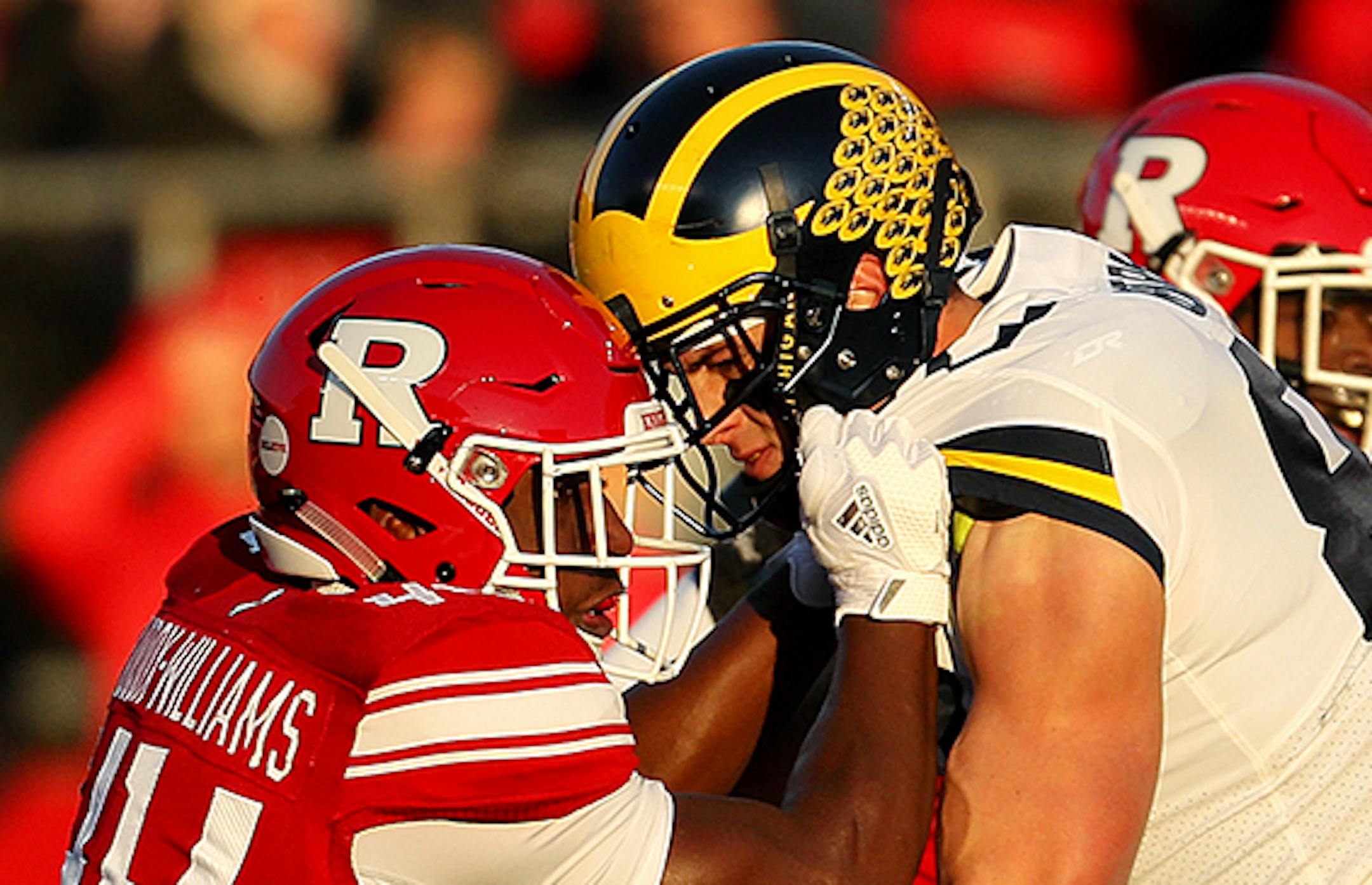 FILE -- Players square off during a college football game between Rutgers and Michigan in Piscataway Township, N.J., Nov. 10, 2018. After a season of college football, portions of players’ brains can show worrying signs of damage, even if they did not experience a concussion, according to a timely new study of contact sports and brain health. (Rick Loomis/The New York Times)