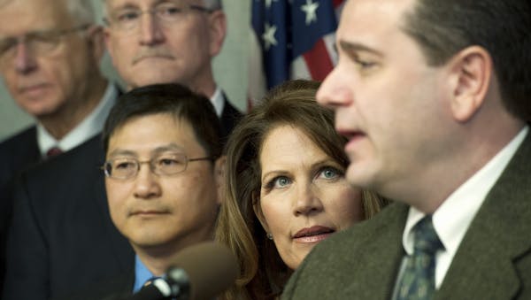 Surrounded by doctors and patients, Congresswoman Michele Bachmann and State Senator Sean Nienow (R-Cambridge) held a joint news conference to discuss