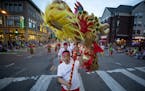 Performers from CAAM Chinese Dance Theater during the Torchlight Parade. ] CARLOS GONZALEZ &#x2022; cgonzalez@startribune.com &#x2013; July 18, 2018, 