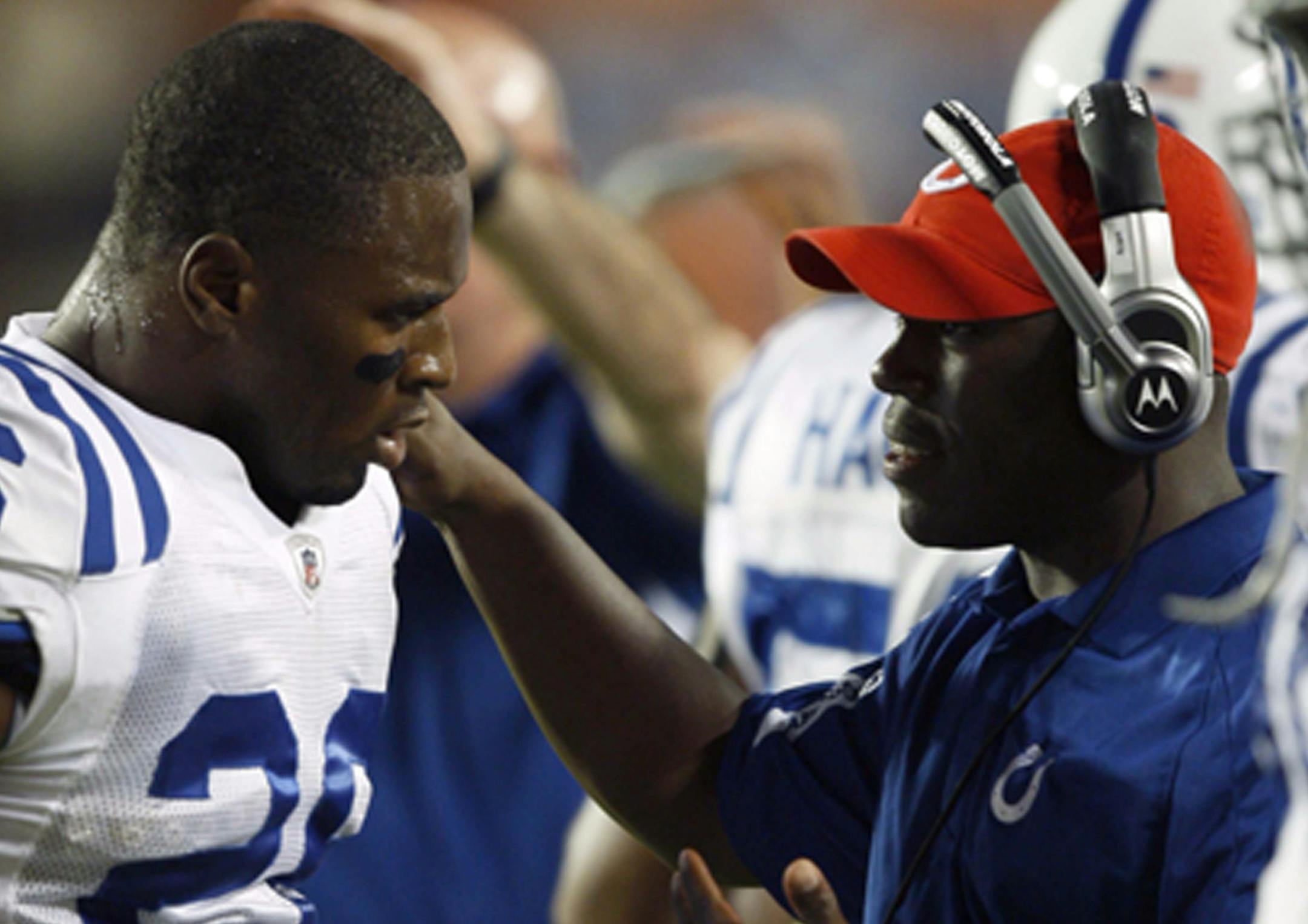 Colts defensive backs coach Alan Williams (right, with cornerback Kelvin Hayden) has been named Vikings defensive coordinator..