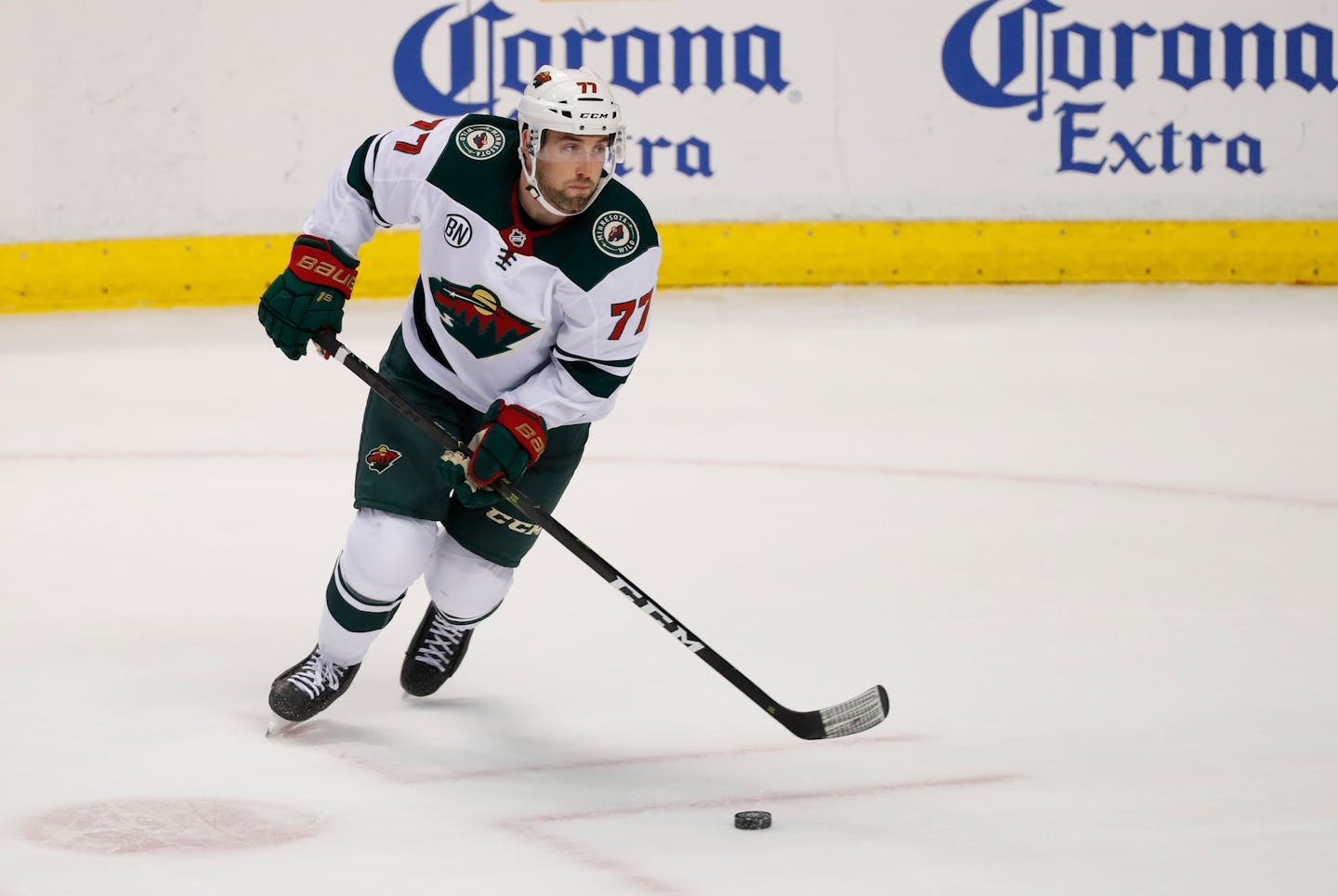 Minnesota Wild defenseman Brad Hunt skates with the puck during the second period of an NHL hockey game against the Florida Panthers, Friday, March 8, 2019 in Sunrise, Fla. (AP Photo/Wilfredo Lee)