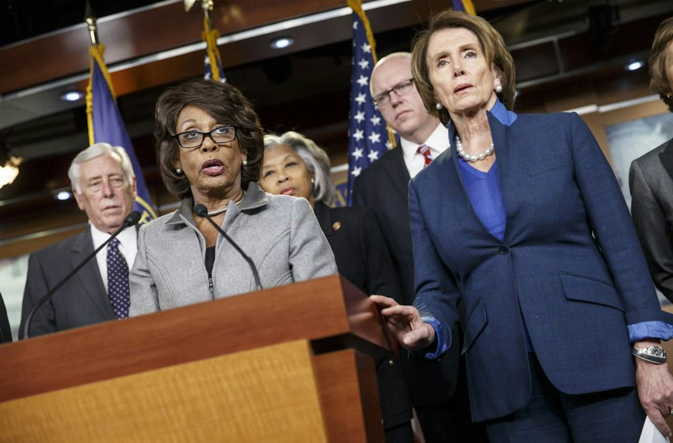 From left, House Minority Whip Steny Hoyer of Md., Rep. Maxine Waters, D-Calif.,Rep. Joyce Beatty, D-Ohio, Rep. Joe Crowley, D-N.Y., and House Minority Leader Nancy Pelosi of Calif., hold a news conference on Capitol Hill in Washington, Thursday, Dec. 4, 2014, about the looming fight over terrorism insurance. As Congress races to its lame-duck finish, time is running out on a government program that provides a backstop to private-sector insurance against terrorist attacks.The program was enacted