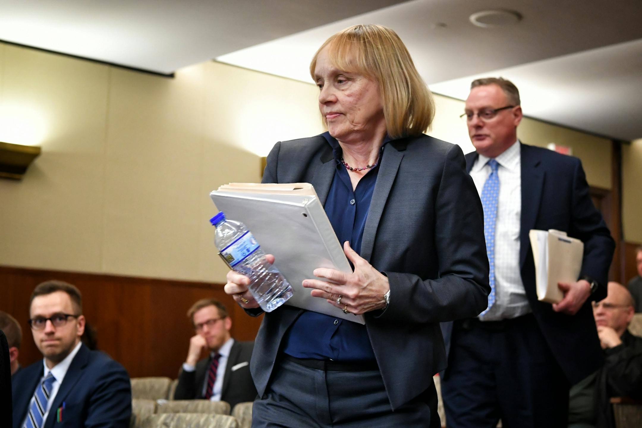 Ted Mondale and Michele Kelm-Helgen took their seats to respond after Minnesota Legislative Auditor James Nobles spoke before the committee.