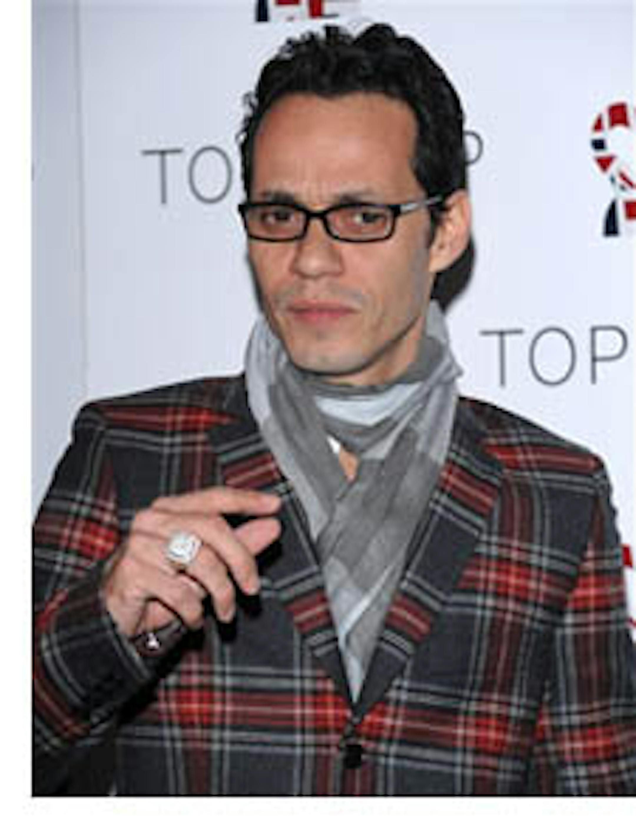 FILE - In this April 1, 2009, file photo, singer Marc Anthony attends a TOPSHOP TOPMAN flagship store opening party in New York. Anthony is the latest celebrity musician to join forces with the Miami Dolphins. The team scheduled a news conference to be held Tuesday, July 21, 2009, in New York for a "major corporate announcement" with Anthony. It was unclear whether Anthony will become a minority owner. (AP Photo/Evan Agostini, File)