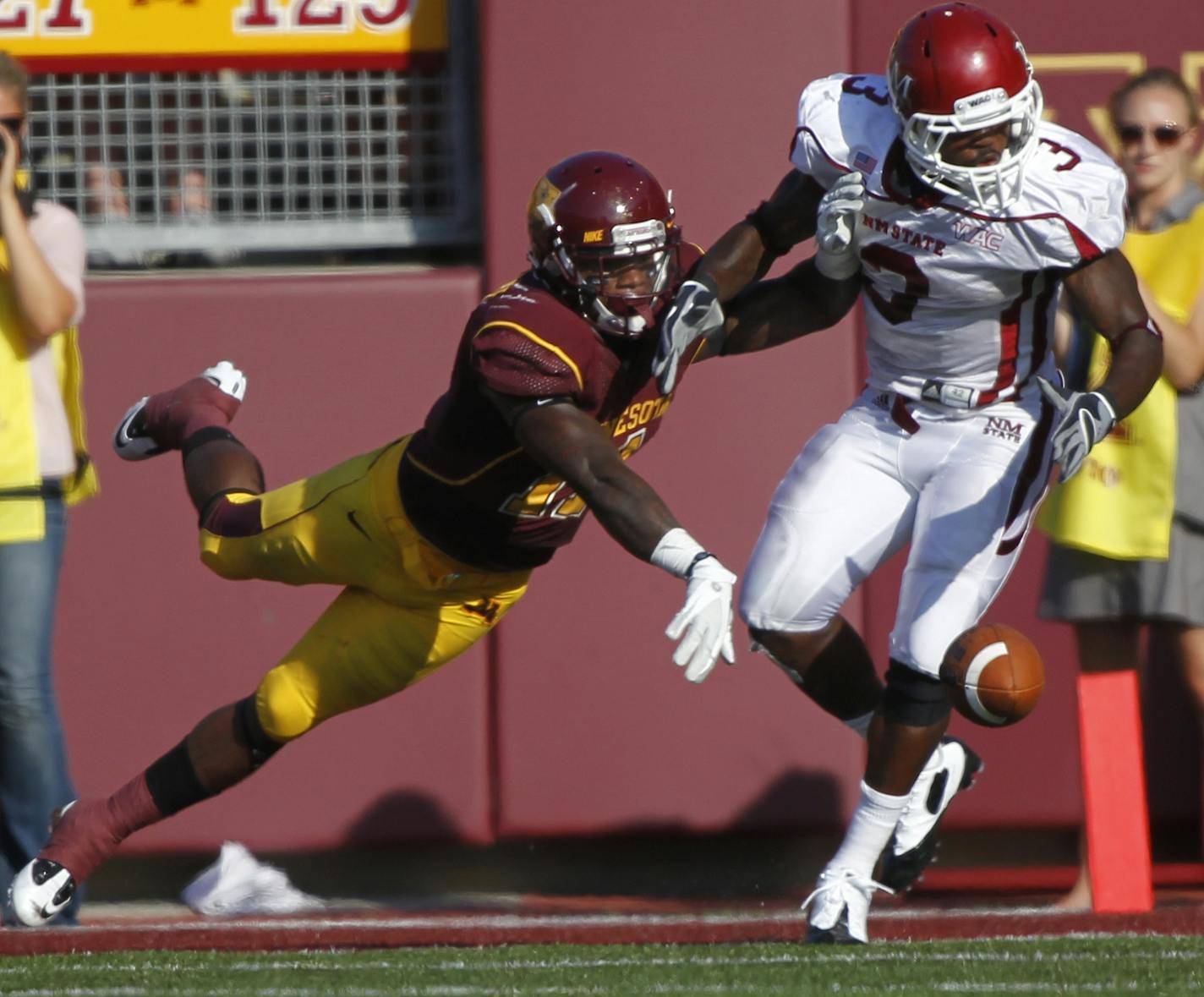 University of Minnesota vs. New Mexico State football. New Mexico State won 28-21. Gophers defensive player Troy Stoudermire knocked down a pass intended for New Mexico State receiver Kenny Turner in second half action.