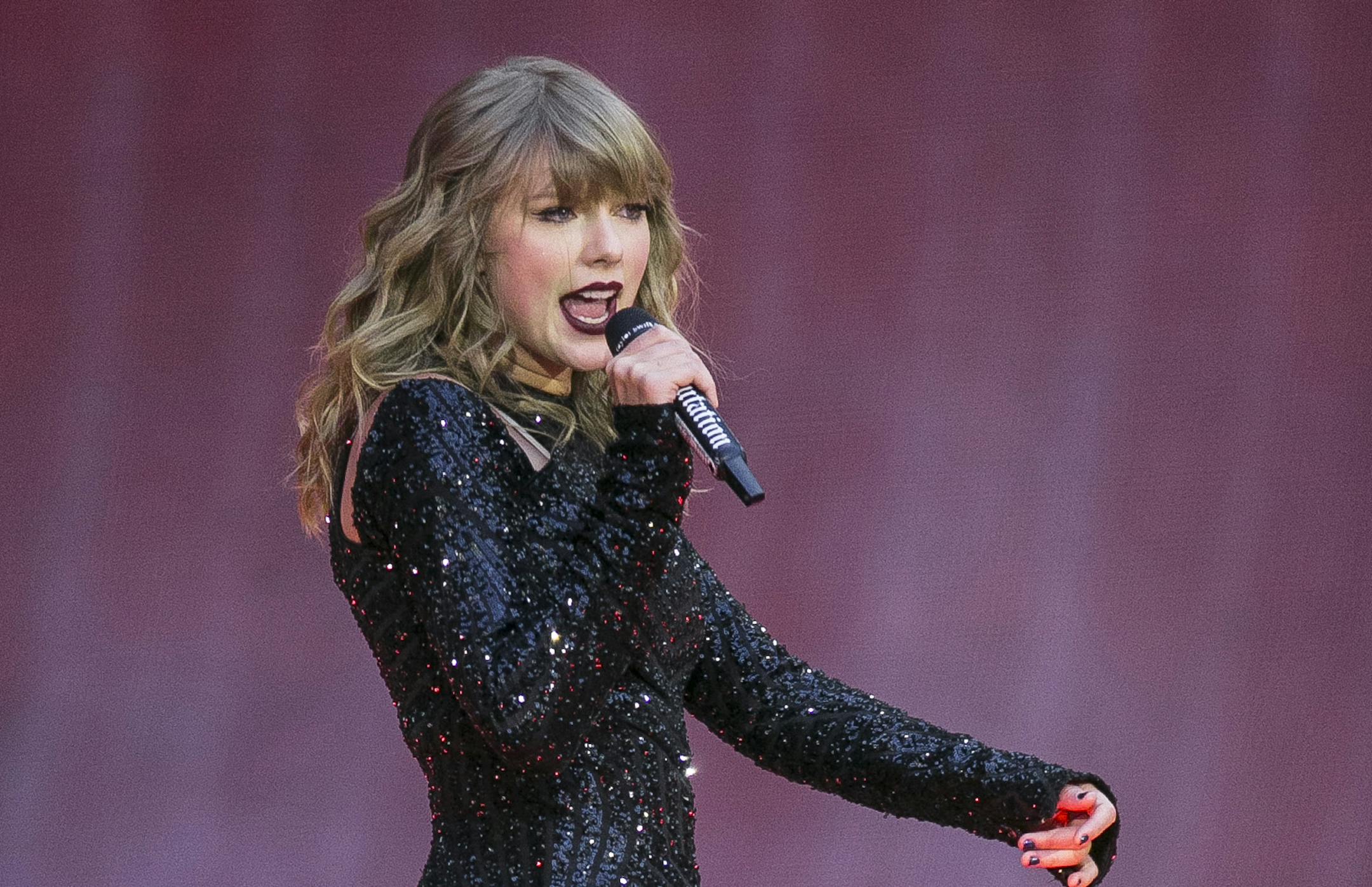 FILE - In this June 22, 2018, file photo, singer Taylor Swift performs on stage in concert at Wembley Stadium in London. ABC will air the one-hour concert special "Taylor Swift City of Lover Concert" at 10 p.m. EDT. It was filmed last September at L'Olympia Theater in Paris. (Photo by Joel C Ryan/Invision/AP, File)