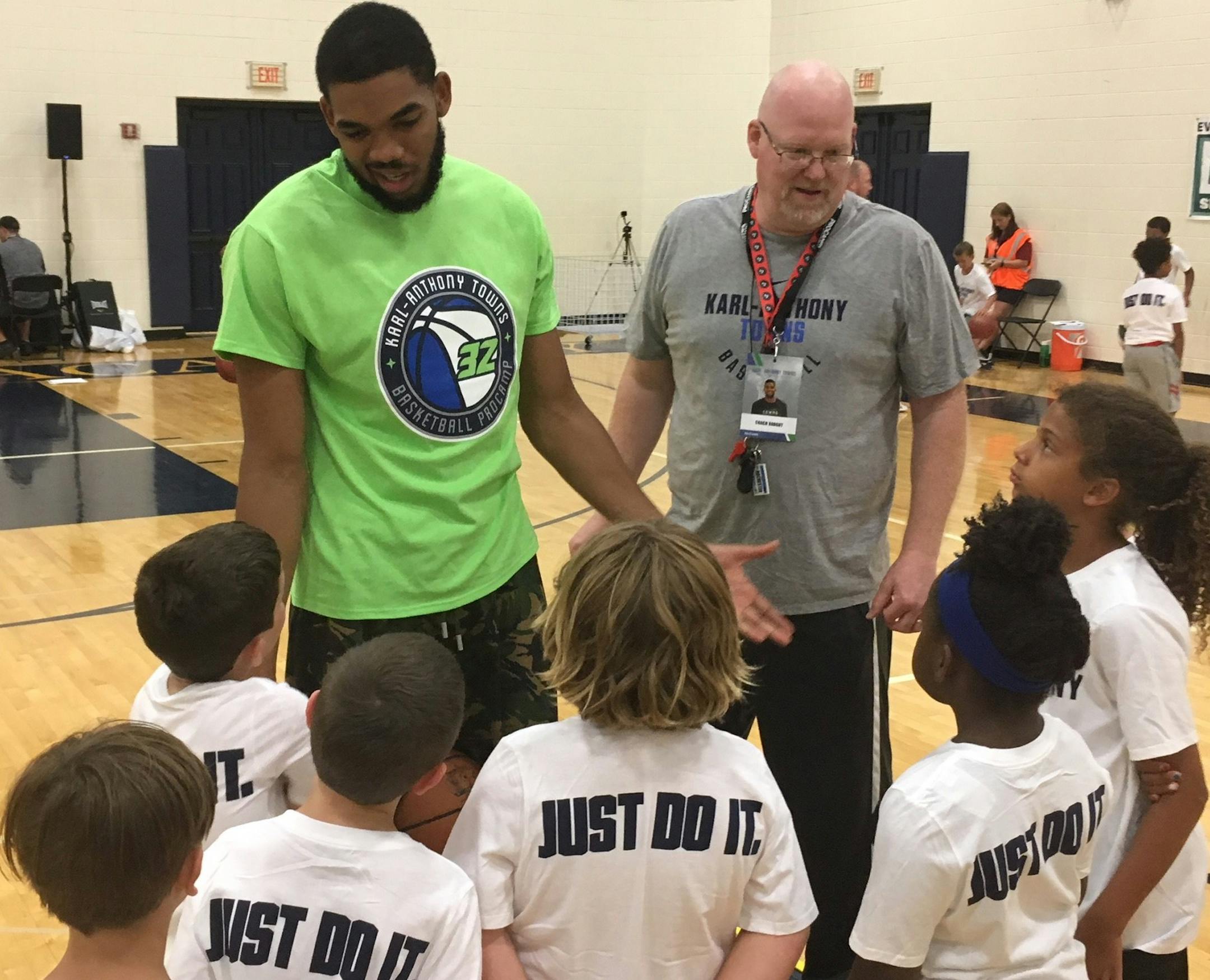 Timberwolves' center Karl-Anthony Towns addresses kids at his basketball camp Wednesday at Providence Academy in Plymouth. Photo/Michael Rand