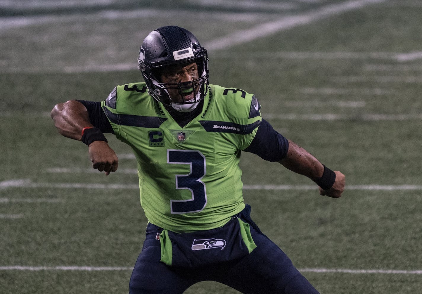 Seattle Seahawks quarterback Russell Wilson reacts after throwing the game winning touchdown during the second half an NFL football game against the Minnesota Vikings, Sunday, Oct. 11, 2020, in Seattle. The Seahawks won 27-26.