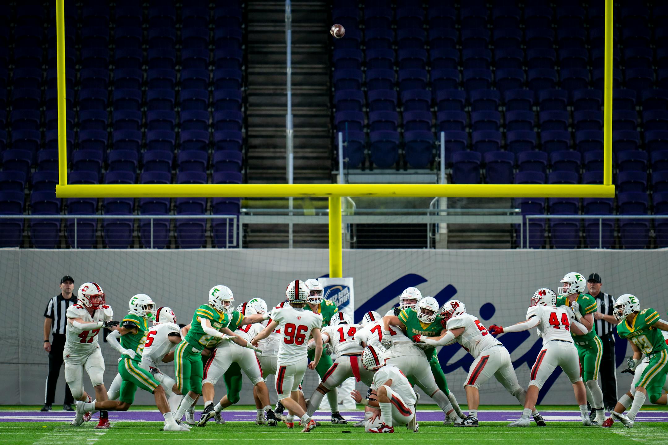 Players fight as Centennial High School scores a field goal at the 6a game against Edina High School at U.S. Bank Stadium for the Prep Bowl XLI in Minneapolis on Friday, Nov. 24, 2023. ] Angelina Katsanis • angelina.katsanis@startribune.com