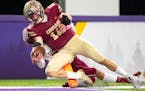 Lakeville South quarterback Camden Dean scored a touchdown against Maple Grove in the Class 6A championship game Friday.