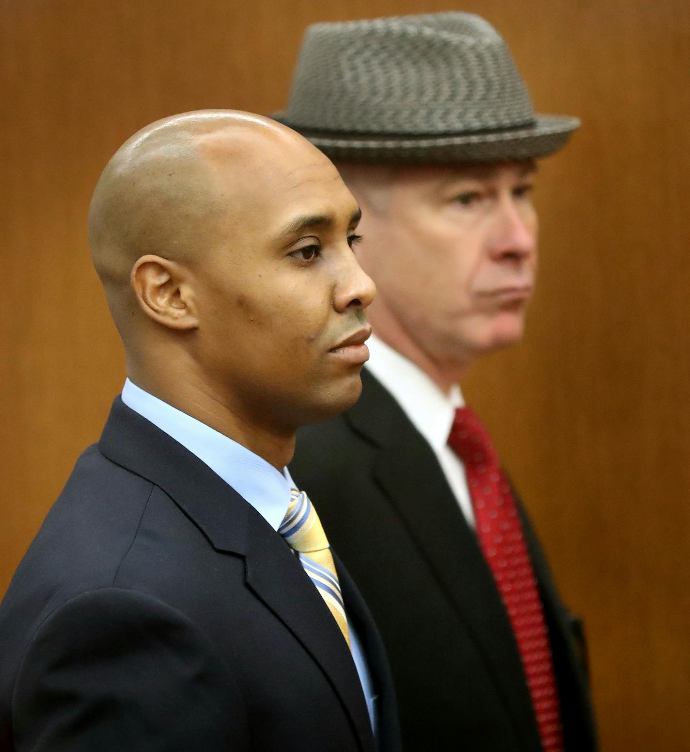 Former Minneapolis police officer Mohamed Noor, center, appeared in Hennepin County District Court with his attorneys, Thomas Plunkett, right, and Peter Wold, not pictured, but Noor left court without entering a plea to the charges against him in the death of Justine Ruszczyk Damond Tuesday, May 8, 2018, in Minneapolis, MN. ] DAVID JOLES &#xef; david.joles@startribune.com Former Minneapolis police officer Mohamed Noor appeared in Hennepin County District Court