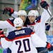 USA forward Zach Parise (9) celebrates his goal against the Czech Republic with teammates Phil Kessel (81) and USA defenseman Ryan Suter during the se