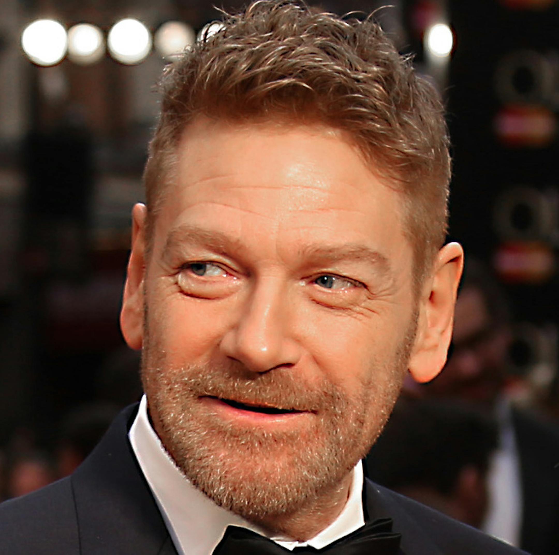 Actors Kenneth Branagh, left, and Dame Judi Dench poses for photographers upon arrival at the Olivier Awards in London, Sunday, April 3, 2016. (Photo by Joel Ryan/Invision/AP)