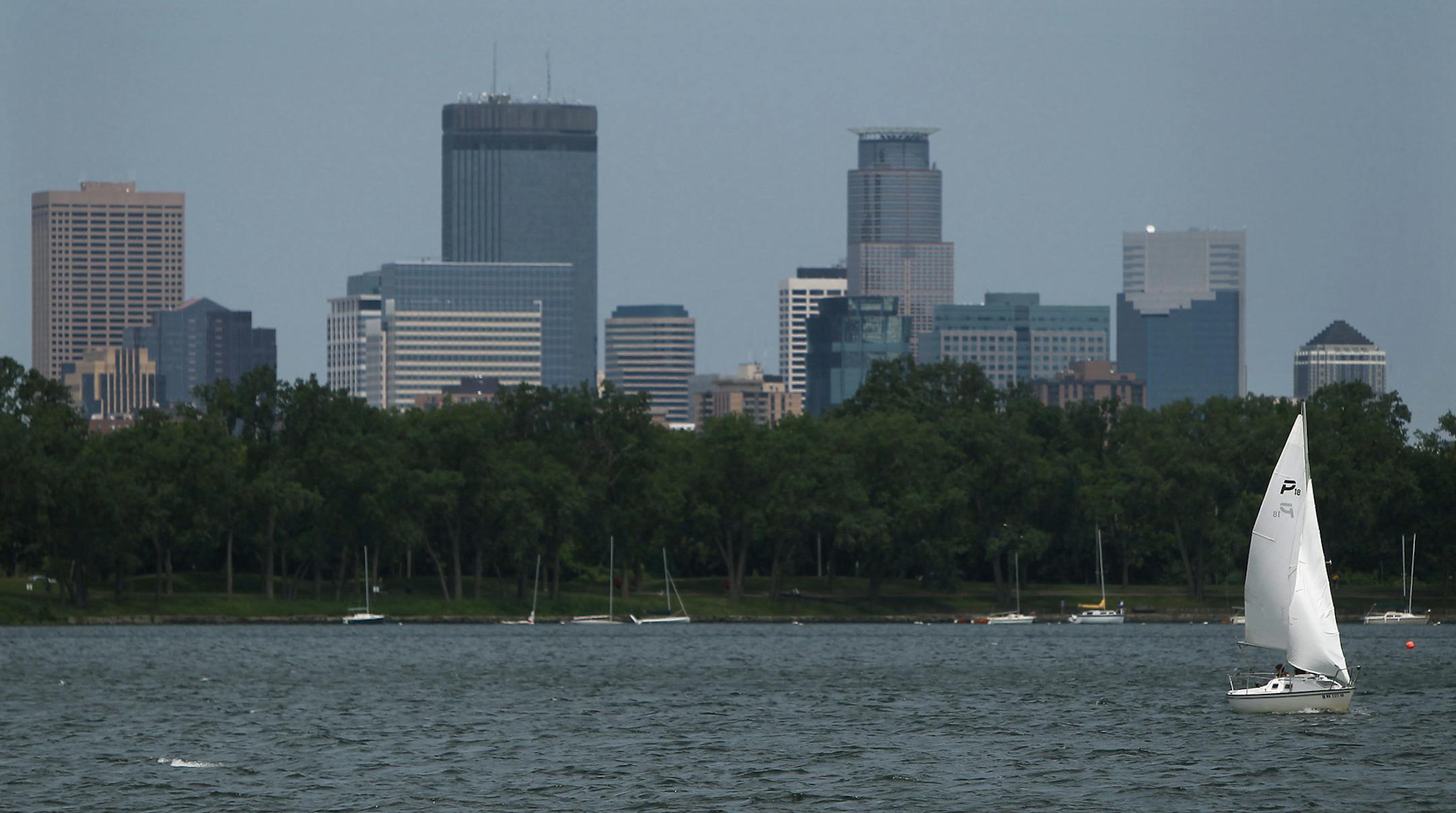 ELIZABETH FLORES • eflores@startribune.com June 14, 2011 - Minneapolis, MN - As secretary of war 1817-25, John C. Calhoun ordered the establishment of Fort Snelling. But it was his standing as a passionate pro-slavery orator that prompted local Civil War history buff John Winters to suggest the name change. IN THIS PHOTO:] Boaters made their way around Lake Calhoun. ORG XMIT: MIN2015062212323031 ORG XMIT: MIN1506221235420484