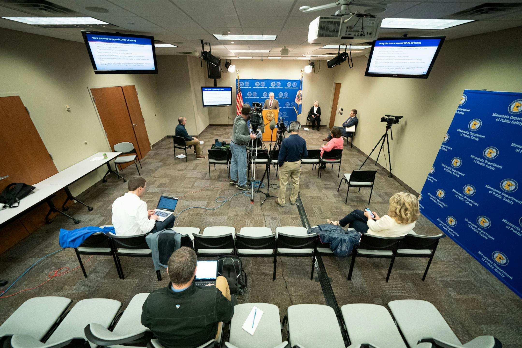 In a tightly pooled press conference, Minn. Governor Walz provided an update on the state's next steps to respond to COVID-19. He was joined by Health Commissioner Jan Malcolm, Employment and Economic Development Commissioner Steve Grove, and Homeland Security and Emergency Management Director Joe Kelly and other state officials.