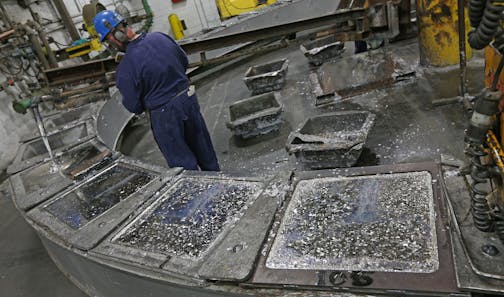 Gopher Resource employee Tracy Bennett poured melted lead from recycled batteries into ingots for reuse at the Eagan plant on 4/16/14. Eagan-based Gopher Resource recycles the lead and plastic out of millions of car/truck batteries a year (That equals 540 million pounds of lead and 30 million pounds of plastic each year.) Gopher Resource has plants in Eagan, MN. and Florida. The company added 72 workers last year in Minnesota, and just opened a Florida plant, and is increasing total production a