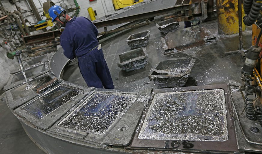 Gopher Resource employee Tracy Bennett poured melted lead from recycled batteries into ingots for reuse at the Eagan plant on 4/16/14. Eagan-based Gopher Resource recycles the lead and plastic out of millions of car/truck batteries a year (That equals 540 million pounds of lead and 30 million pounds of plastic each year.) Gopher Resource has plants in Eagan, MN. and Florida. The company added 72 workers last year in Minnesota, and just opened a Florida plant, and is increasing total production a