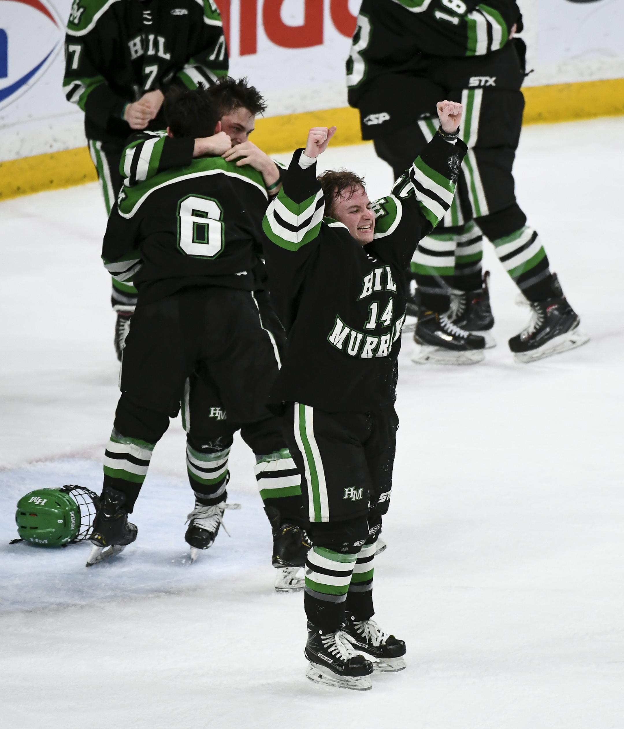 Hill-Murray defenseman Matthew Fleischhacker (14) celebrated with teammates after their 2A championship victory. ] Aaron Lavinsky • aaron.lavinsky@startribune.com Hill-Murray played Eden Prairie in the Class 2A state tournament championship game on Saturday, March 7, 2020 at the Xcel Energy Center in St. Paul, Minn. ORG XMIT: MIN2003072234503706