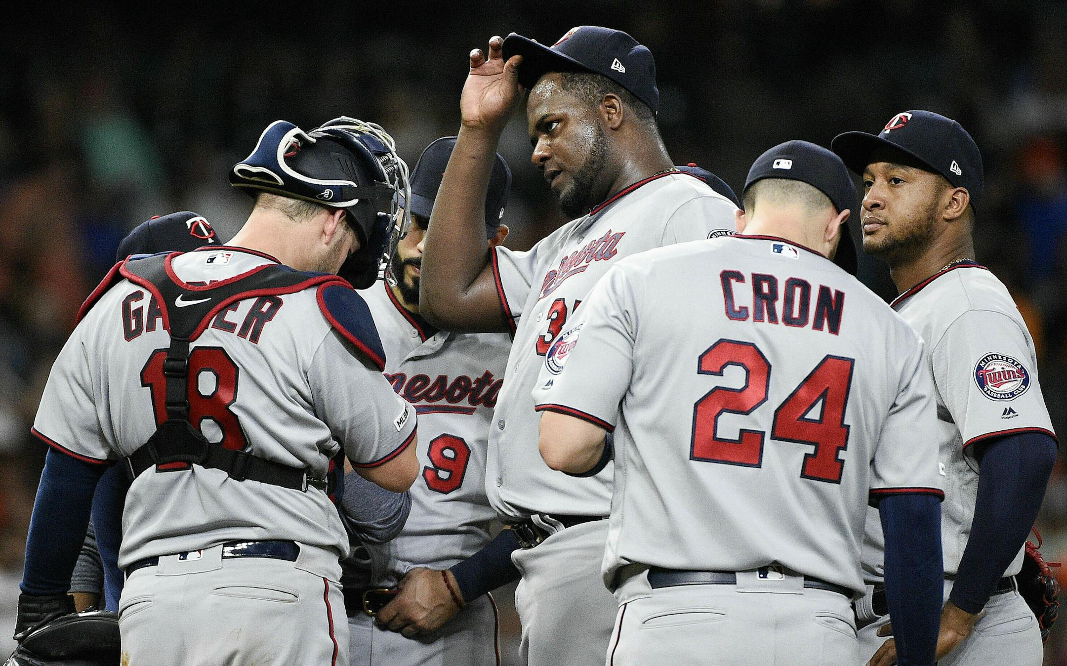 Minnesota Twins starting pitcher Michael Pineda, center, and teammates gather at the mound with pitching coach Wes Johnson, far left, during the fifth inning of a baseball game against the Houston Astros, Tuesday, April 23, 2019, in Houston. (AP Photo/Eric Christian Smith)