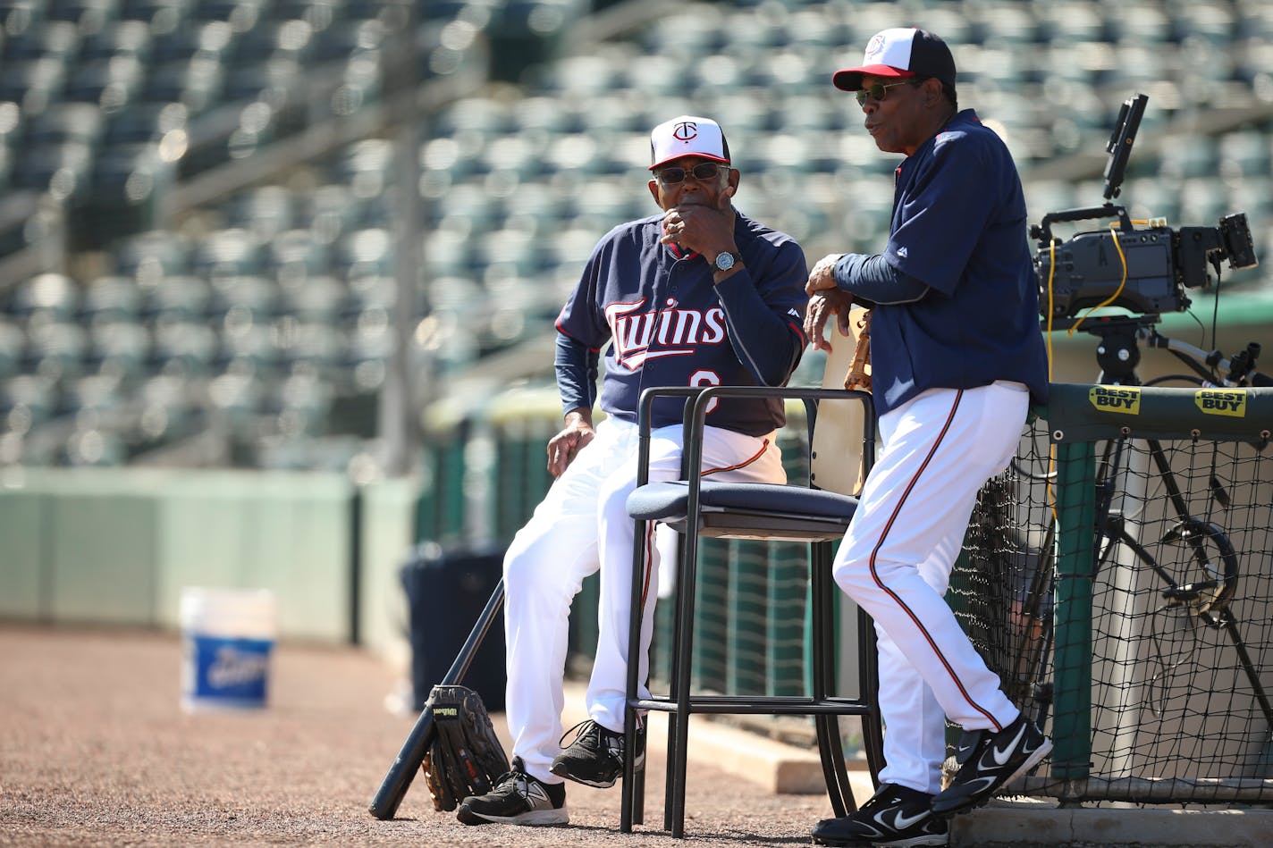 Former Twins players Tony Oliva, left, and Rod Carew shot the breeze while watching outfielders work out Tuesday morning at Hammond Stadium. ] JEFF WHEELER • jeff.wheeler@startribune.com The Twins held another spring training workout Tuesday morning, March 3, 2015, at Hammond Stadium in Fort Myers, FL.