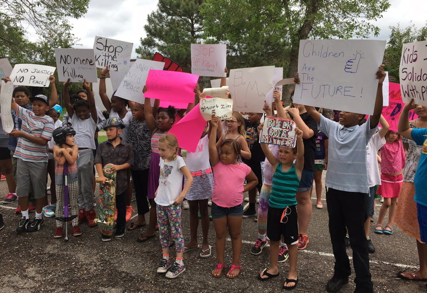 Sunday midday children's march from Maxfield Elementary to JJ Hill school in St. Paul, which is where Philando Castile worked.