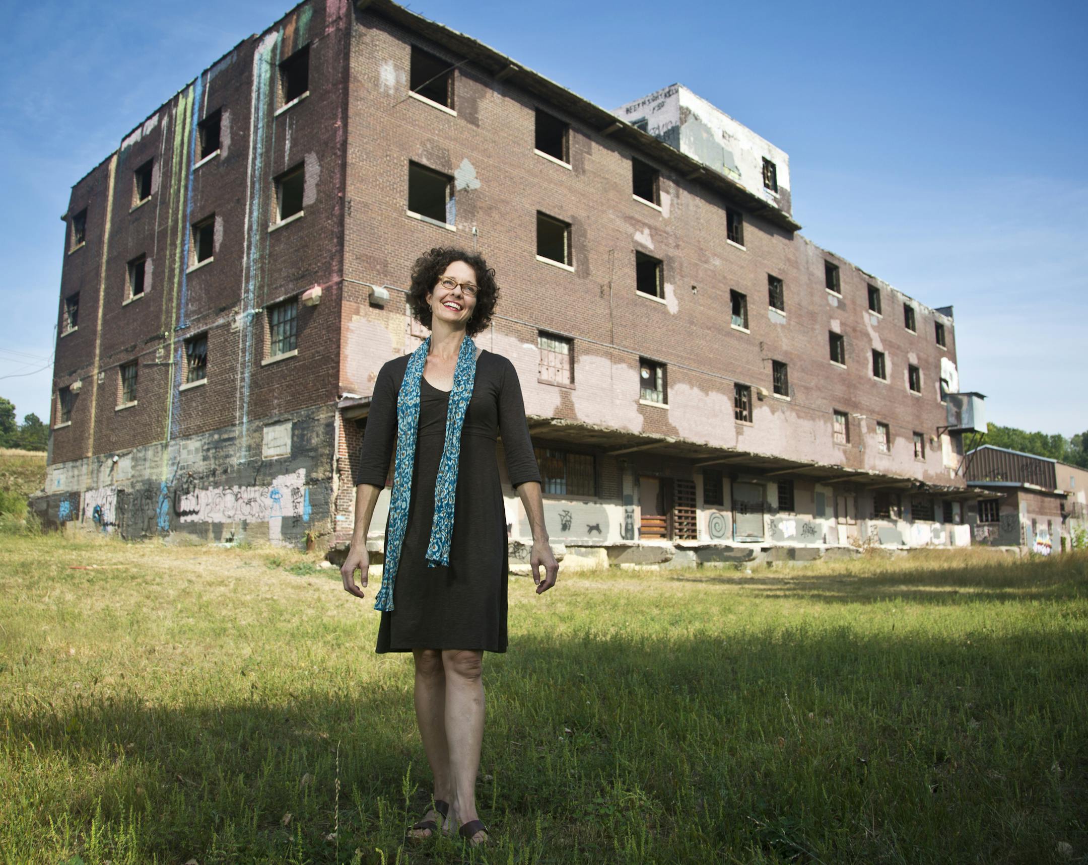 Tracey Sides, the winner of the $1 million Forever St. Paul contest, posed in front of the vacant warehouse she plans to remake into a unique food hub in St. Paul, Minn., on Monday, September 9, 2013. ] (RENEE JONES SCHNEIDER ‚Ä¢ reneejones@startribune.com)