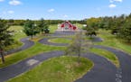 The 64-acre property on Birch Lake in Deerwood includes an outdoor go-cart track, indoor bowling alley and a main house known to locals as the 'Red Ba