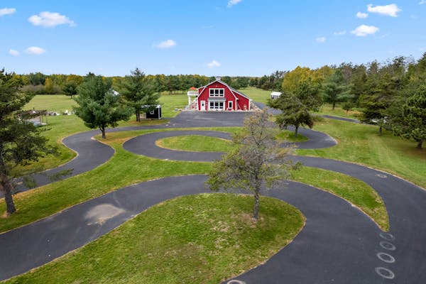 The 64-acre property on Birch Lake in Deerwood includes an outdoor go-cart track, indoor bowling alley and a main house known to locals as the 'Red Ba