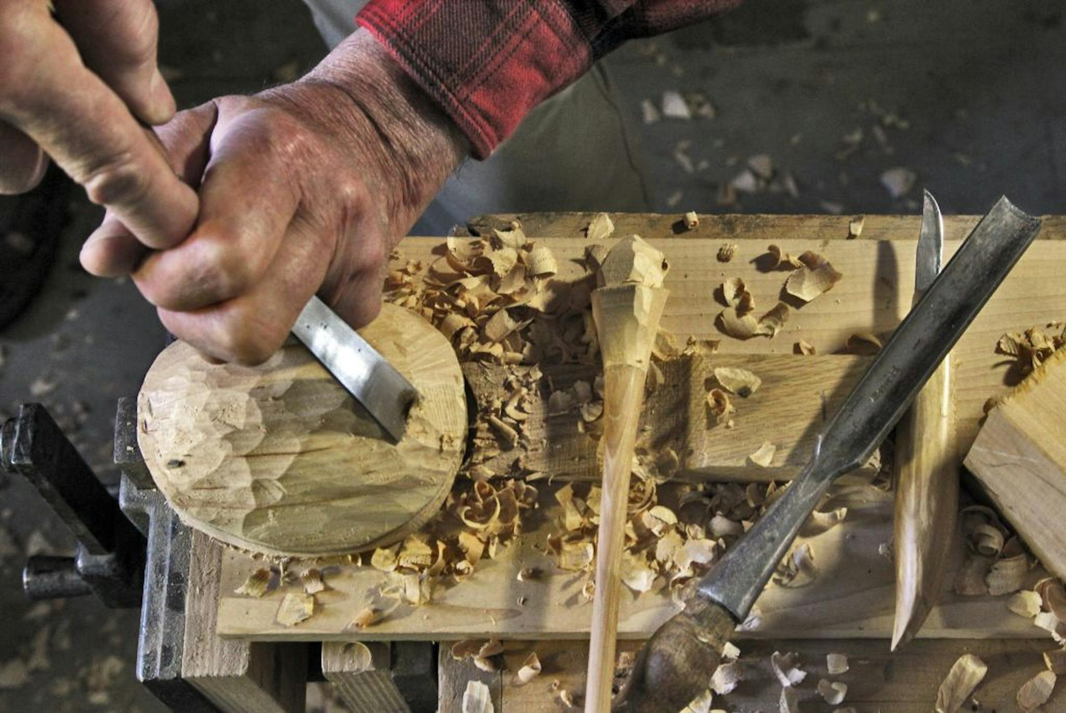 Steve Stortz starts with a basswood block, hollows it out, and creates the head of the turtle from hickory. He finishes them with acrylic paint.