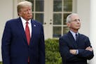 President Donald Trump and Dr. Anthony Fauci, director of the National Institute of Allergy and Infectious Diseases, listens as Dr. Deborah Birx, Whit