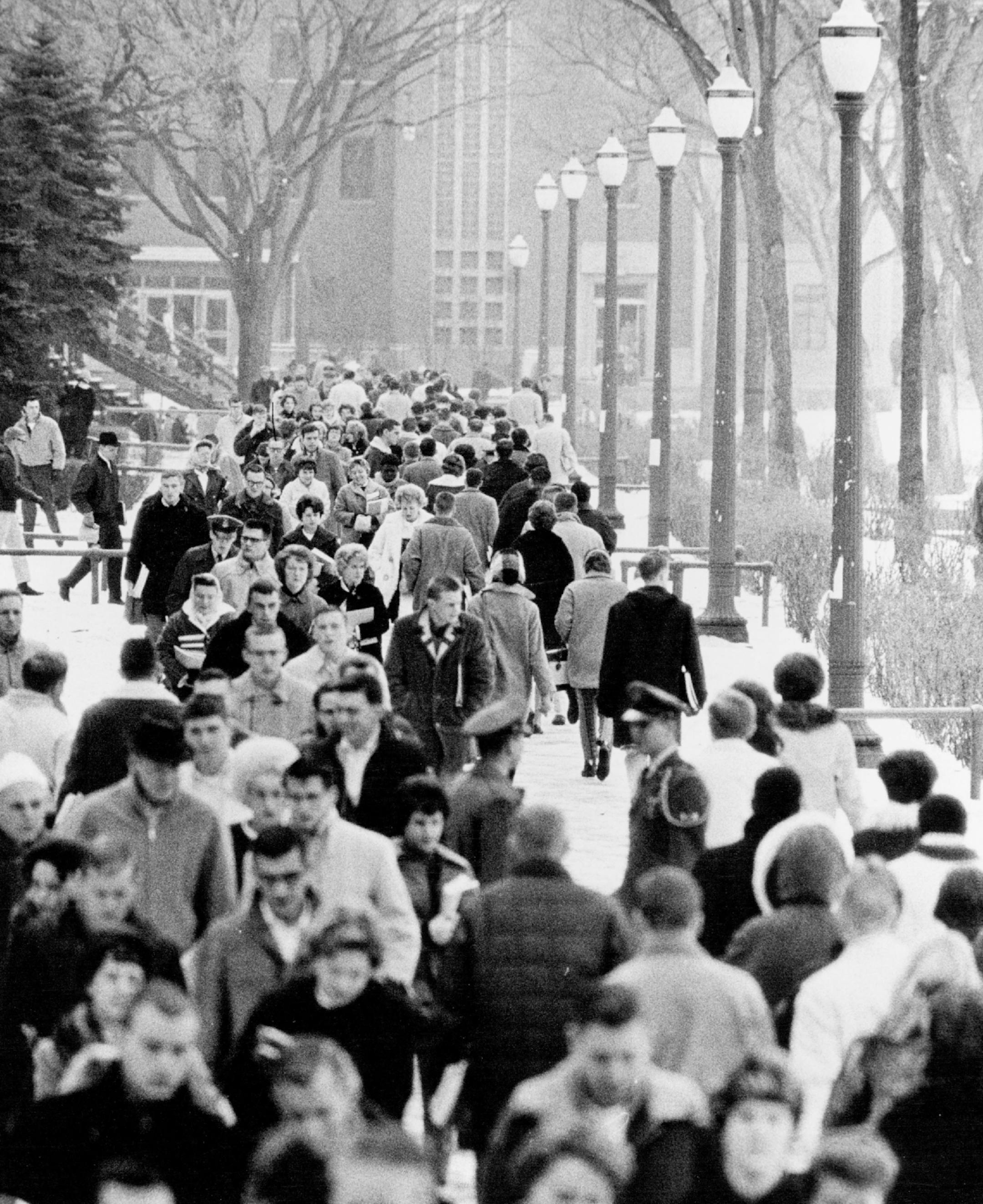 January 8, 1963 The University of Minnesota�s Minneapolis campus was bustling with activity again Monday as the first full week of the winter quarter got under way. This is a between-classes scene along the mall. 'A record winter quarter enrollment is expected at the university. January 6, 1963 January 7, 1963 Gerald R. Brimacombe, Minneapolis Star Tribun