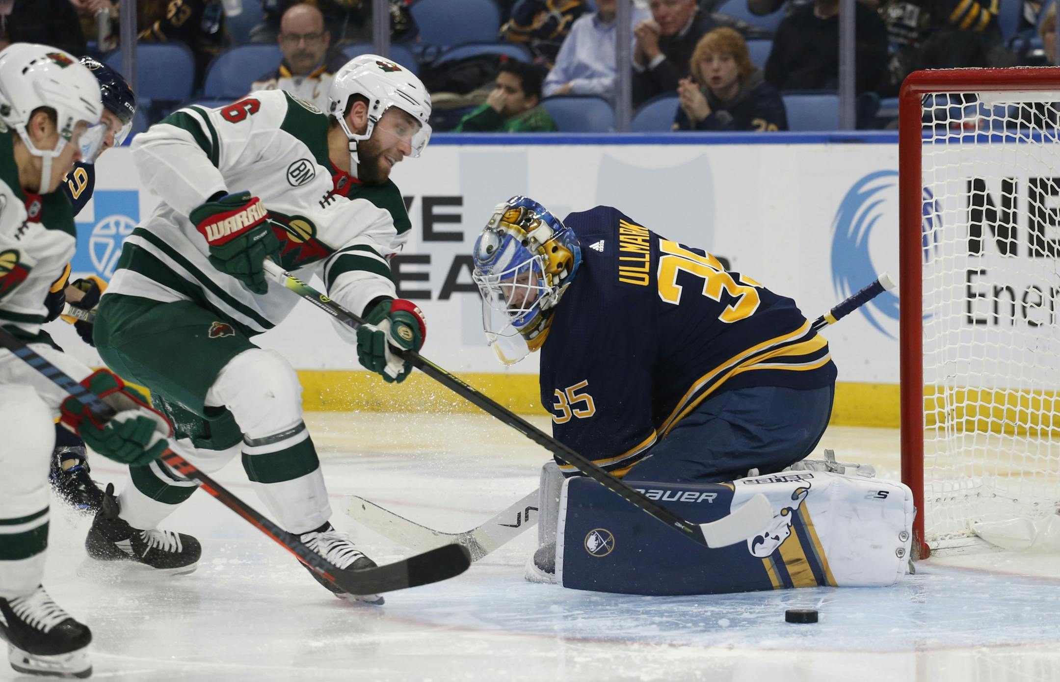 Buffalo Sabres goalie Linus Ullmark (35) stops Minnesota Wild forward Jason Zucker (16) during the second period of an NHL hockey game, Tuesday, Feb. 5, 2019, in Buffalo N.Y.