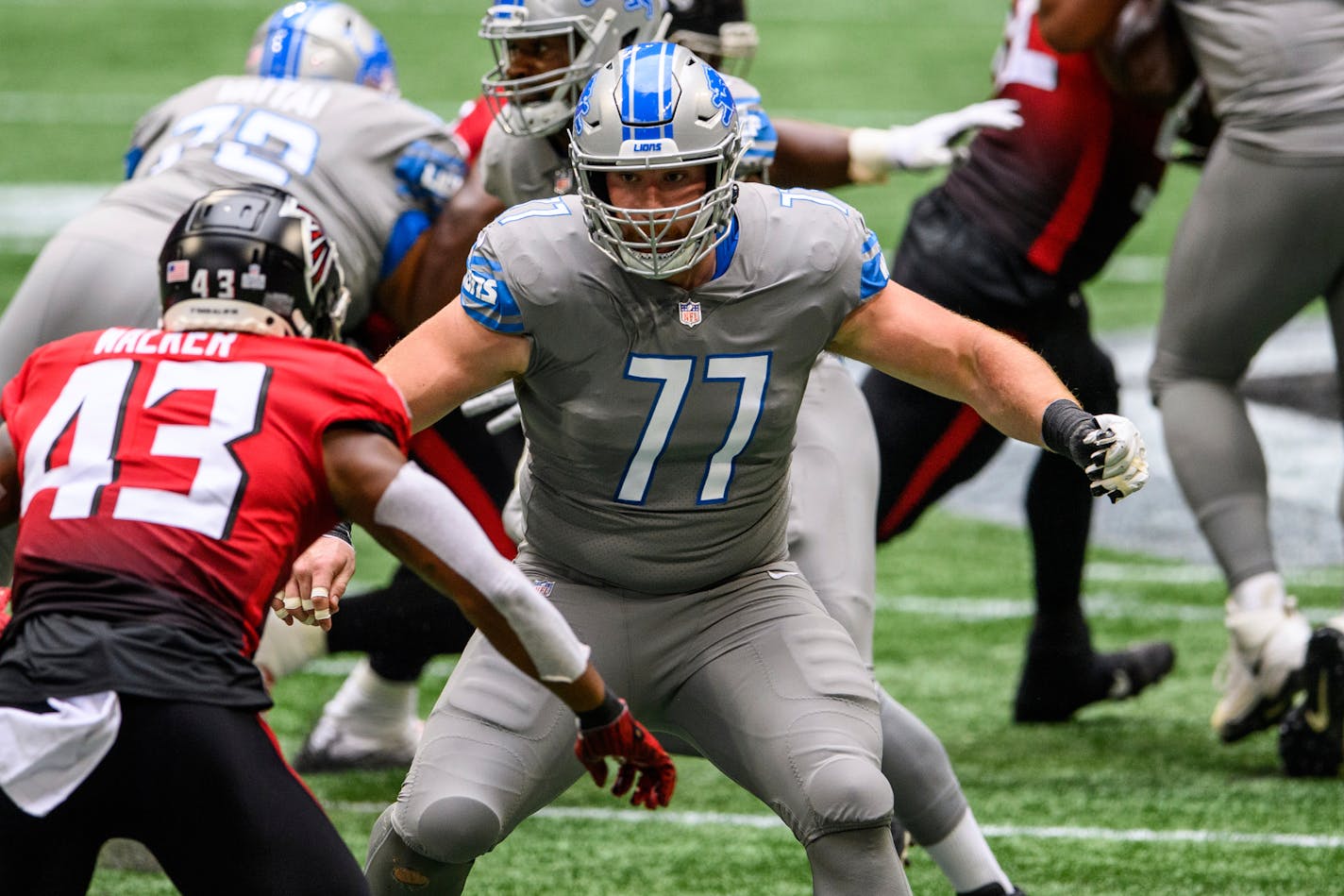 Detroit Lions center Frank Ragnow (77) works during the first half of an NFL football game against the Atlanta Falcons, Sunday, Oct. 25, 2020, in Atlanta. The Detroit Lions won 23-22. (AP Photo/Danny Karnik)