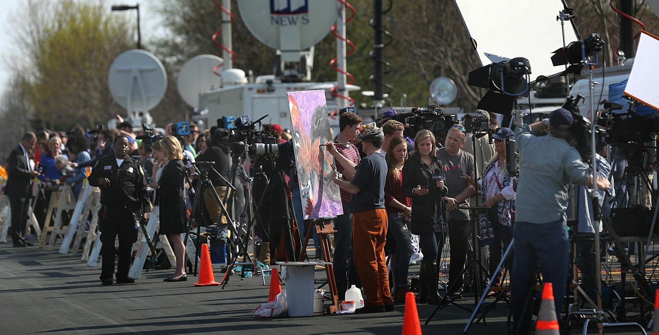 A large crowd of media members and mourners gathered outside Paisley Park.