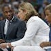 Lynx Head Coach Cheryl Reeve listened to former assistant coach James Wade during a game.