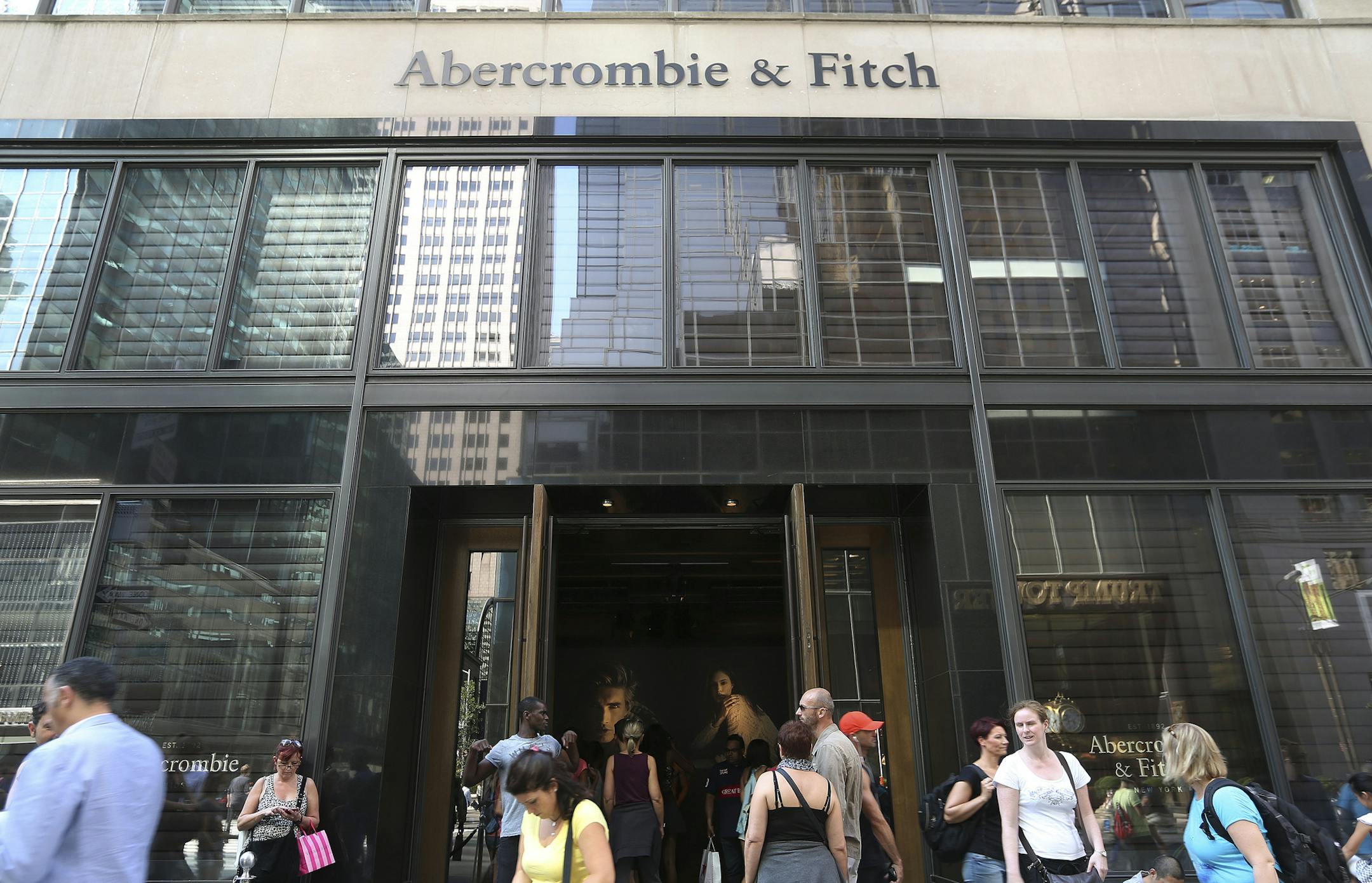 FILE ‚Äî An Abercrombie & Fitch store in New York, Aug. 25, 2014. A ruling that the retailer violated discrimination laws by declining to hire a Muslim woman because she wore a head scarf is one of 11 cases the Supreme Court added to its docket on Oct. 2 ‚Äî though it took no action to address any of the seven petitions before it regarding same-sex marriage. (Hiroko Masuike/The New York Times)
