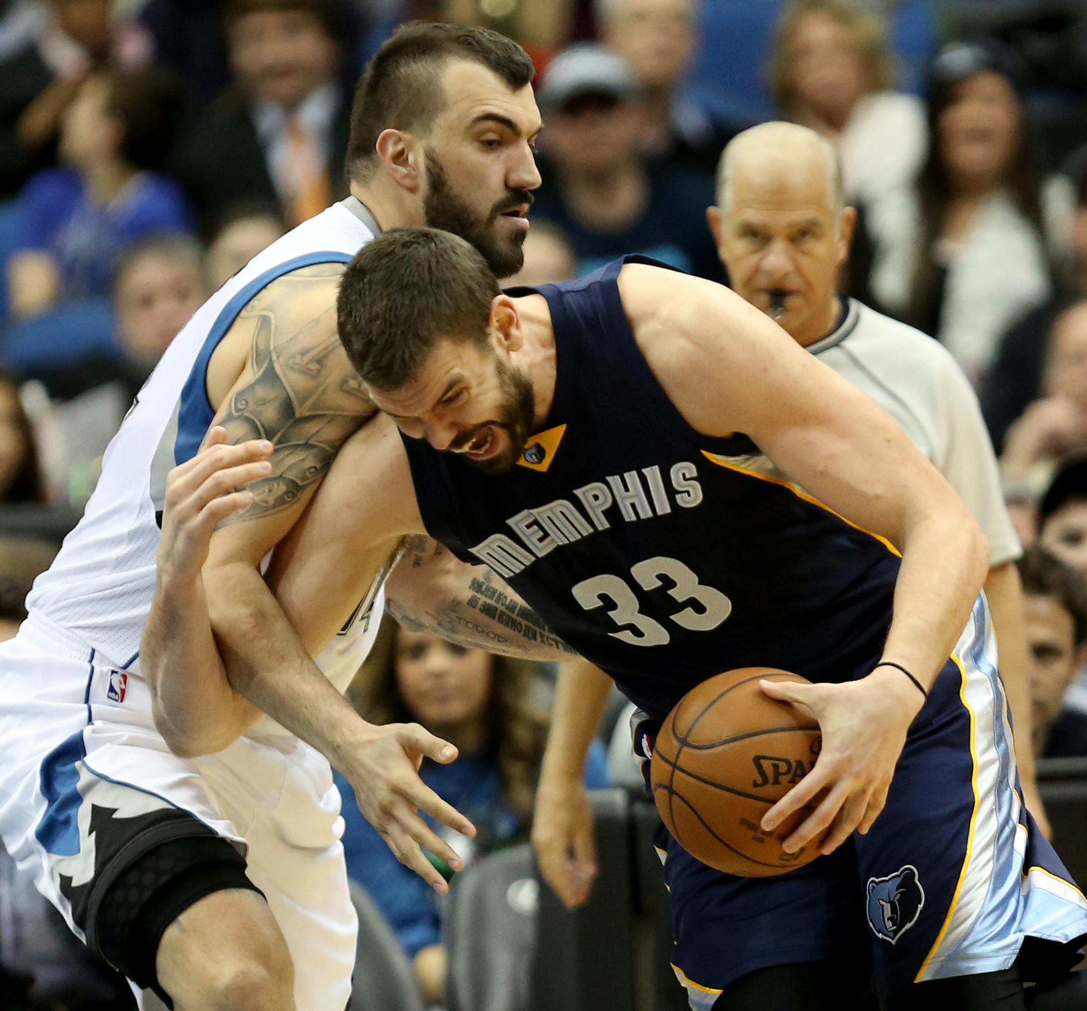 Grizzlies Marc Gasol tried to power passed Wolves Nikola Pekovic during the first half. ] (KYNDELL HARKNESS/STAR TRIBUNE) kyndell.harkness@startribune.com Wolves vs Grizzlies at the Target Center in Minneapolis, Min., Saturday, February 28, 2015. Grizzlies won 101-97 over the Wolves.