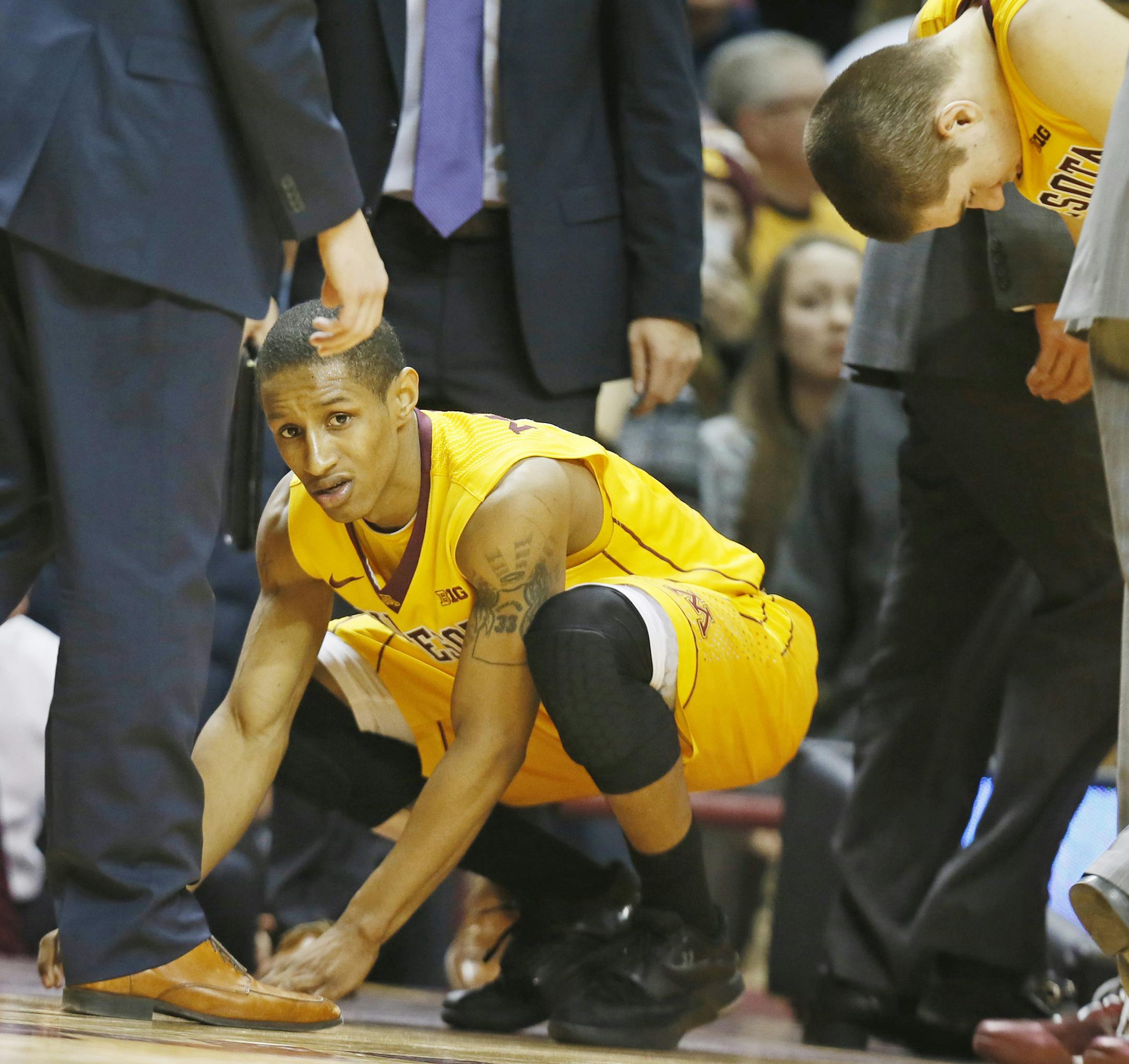 Minnesota Gophers guard DeAndre Mathieu (4) reacted after the officials review the last shot of game, and ruled time had expired Tuesday at Williams arena January 13, 2015 Minneapolis, MN.] Iowa beat Minnesota 77-75 in Big Ten action Tuesday night at Williams Arena.] Jerry Holt/ Jerry.Holt@Startribune.com