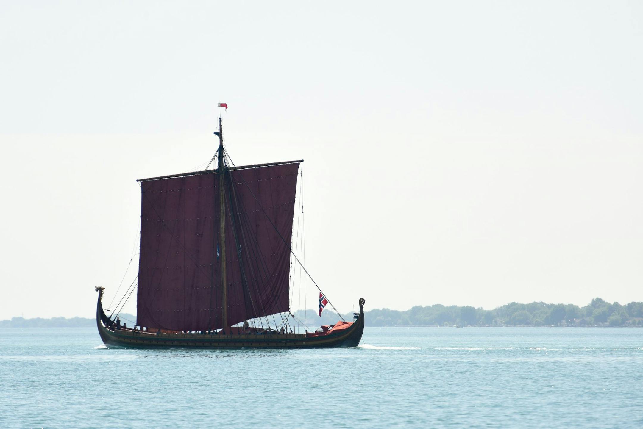 The Draken Harald HÂrfagre, an 111-foot long Viking longboat which sails under the Norwegian flag, makes its way up the Detroit River on its way to Bay City for the 2016 Bay City Tall Ship Celebration, Wednesday, July 13, 2016 in Detroit. (Tanya Moutzalias/MLive.com Detroit via AP)