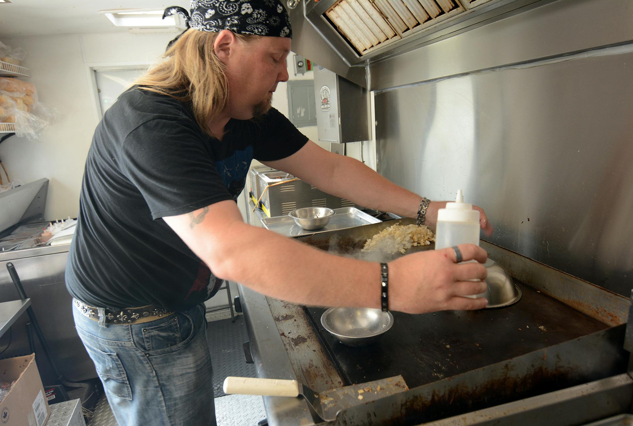 Marty Richie, of Lakeville, manned the grill on Motley Crews Heavy Metal Grill food truck. Business has been good, and he’s currently looking to expand by opening a brick and mortar location somewhere in the south metro. Photo by Liz Rolfsmeier, Special to the Star Tribune