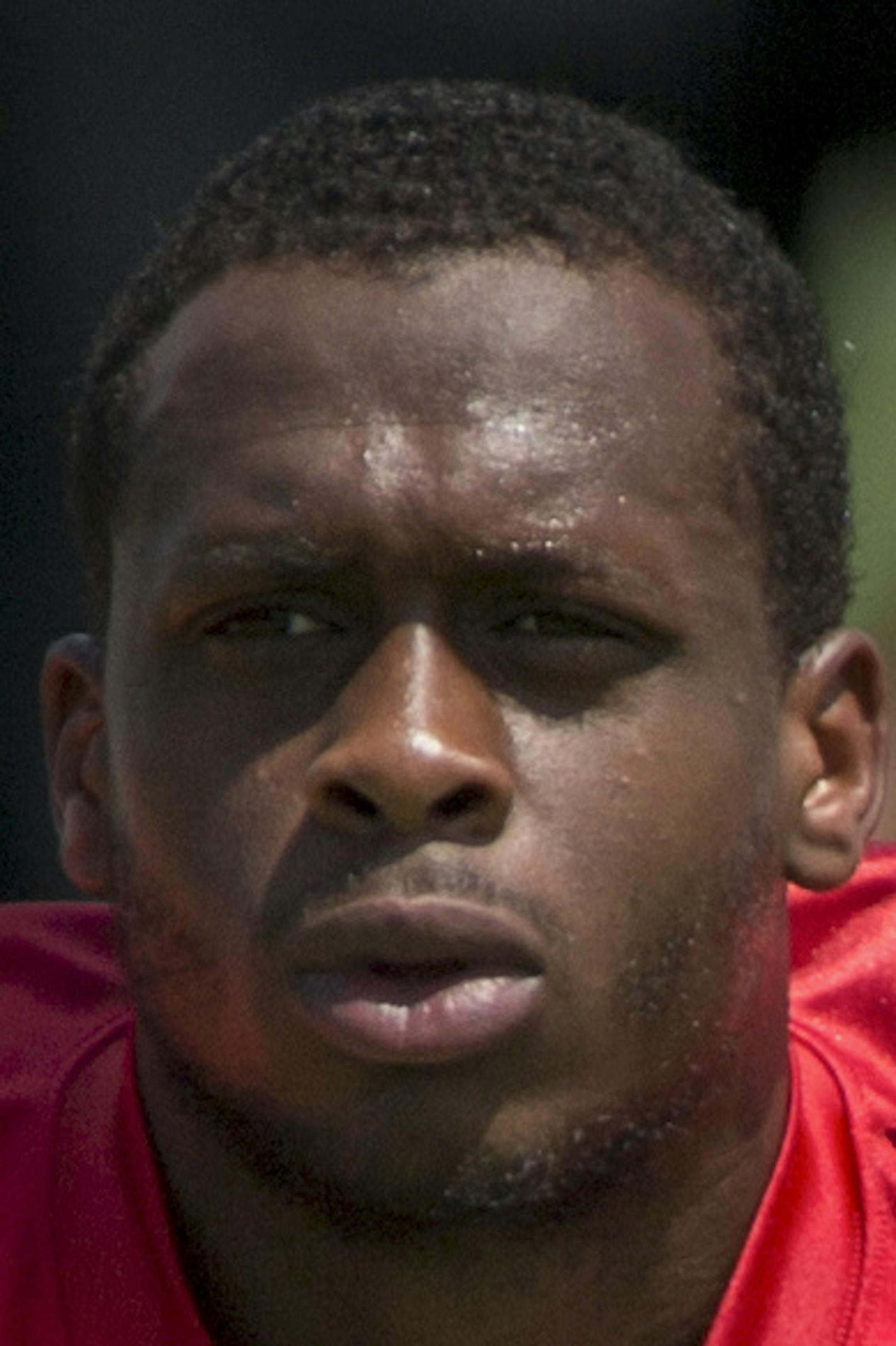 FILE ó New York Jets quarterback Geno Smith stretches during warm-ups at the Jetsí summer training camp session in Florham Park, N.J., Aug. 5, 2015. Smith will miss at least the next six to 10 weeks after sustaining a broken jaw when he was punched by a teammate in the locker room August 11, the coach Todd Bowles said. (Mark Kauzlarich/The New York Times)