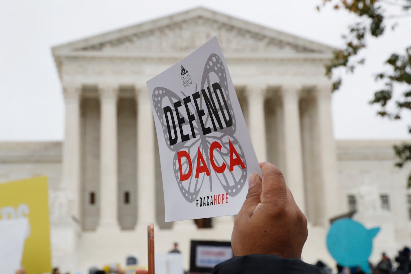 FILE - People rallied outside the Supreme Court in 2019 in support of the Deferred Action for Childhood Arrivals program (DACA), in Washington, Nov. 12, 2019. The U.S. Department of Justice and a civil rights group say they plan to appeal a federal judge's recent ruling declaring illegal a revised version of a federal policy preventing the deportation of hundreds of thousands of immigrants brought to the U.S. as children. (AP Photo/Jacquelyn Martin, File)