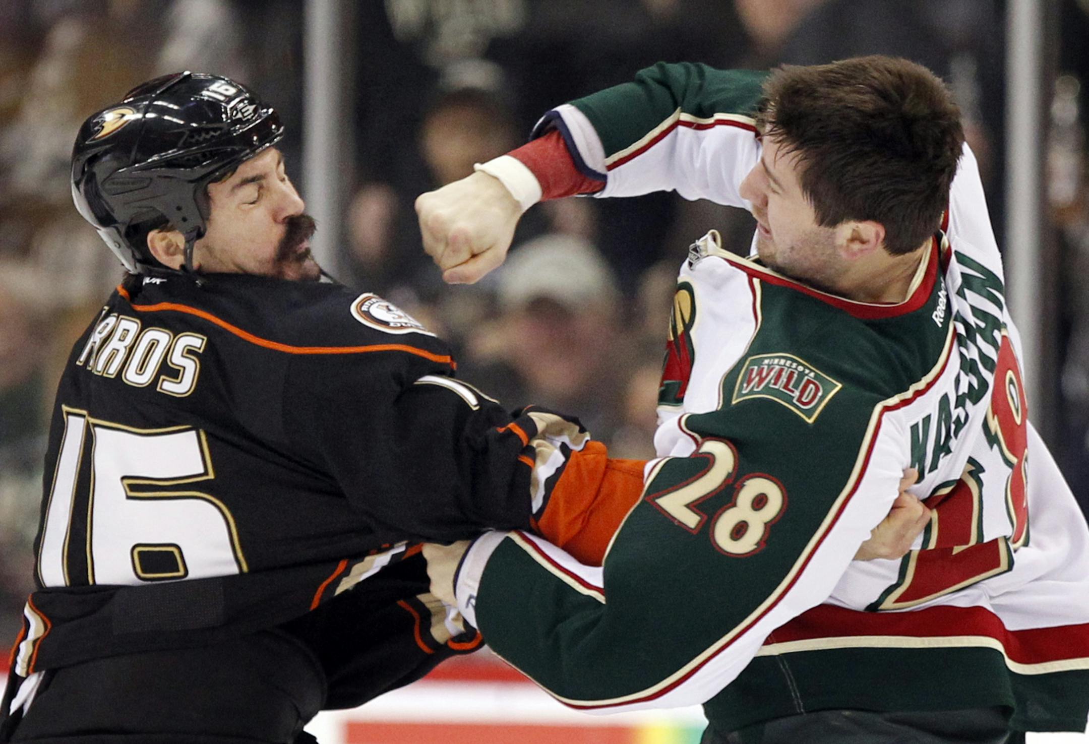 Anaheim's George Parros (16) and Matt Kassian (28) fight in February