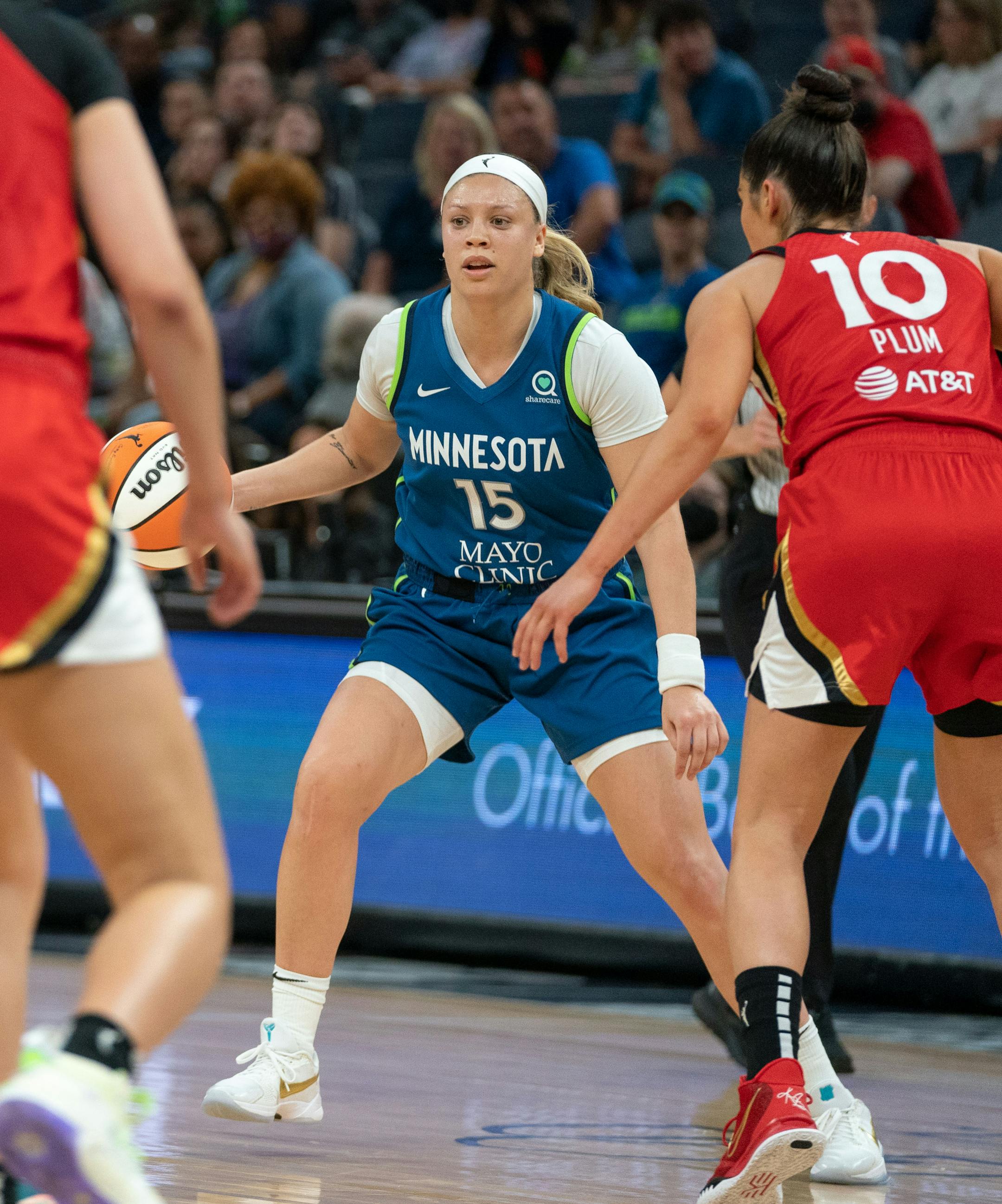 Minnesota Lynx guard Rachel Banham (15) dribbles the ball down the court during the second half of the game against the Las Vegas Aces.
